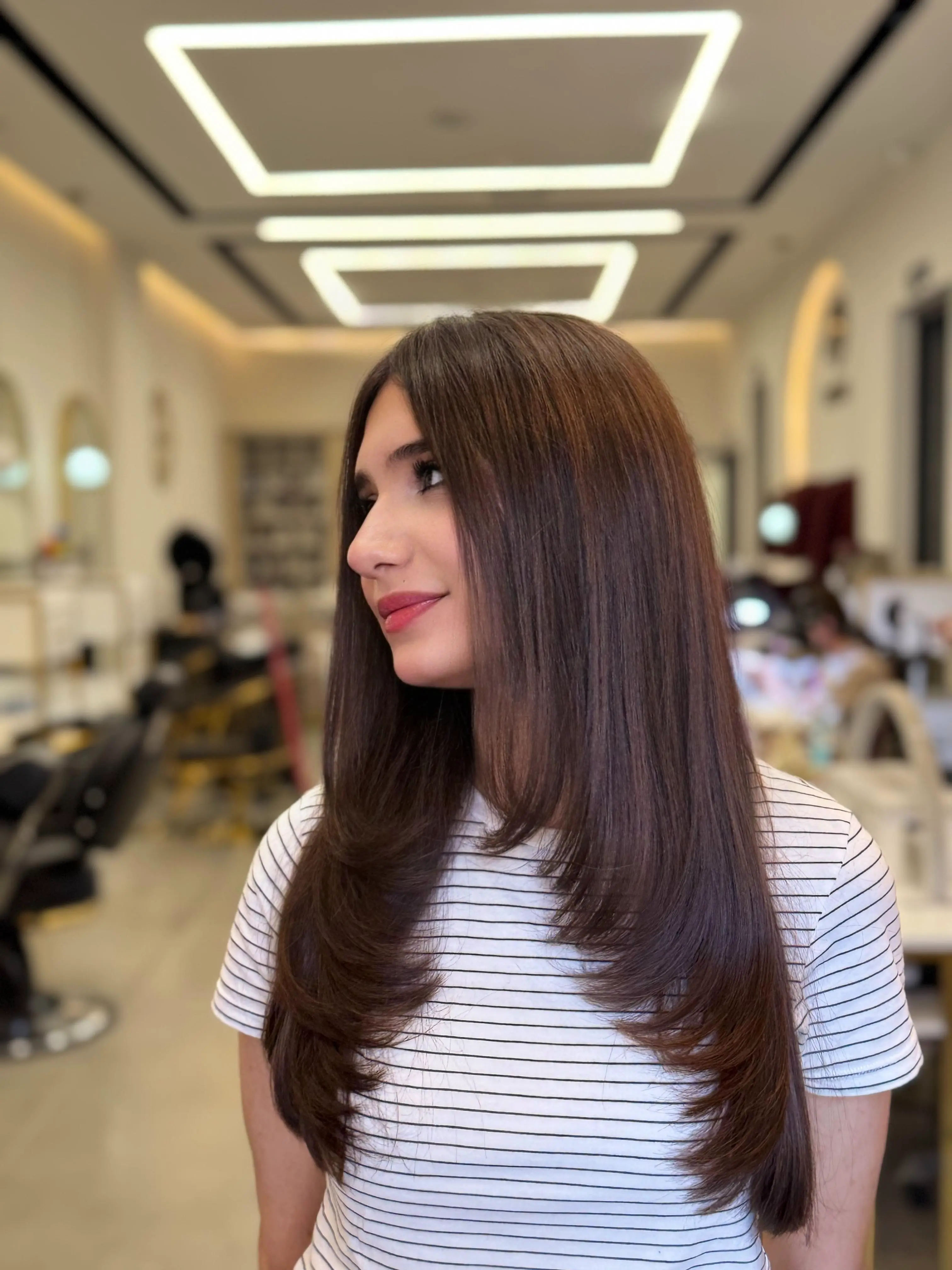 Hair styling result at Divine Beauty Salon