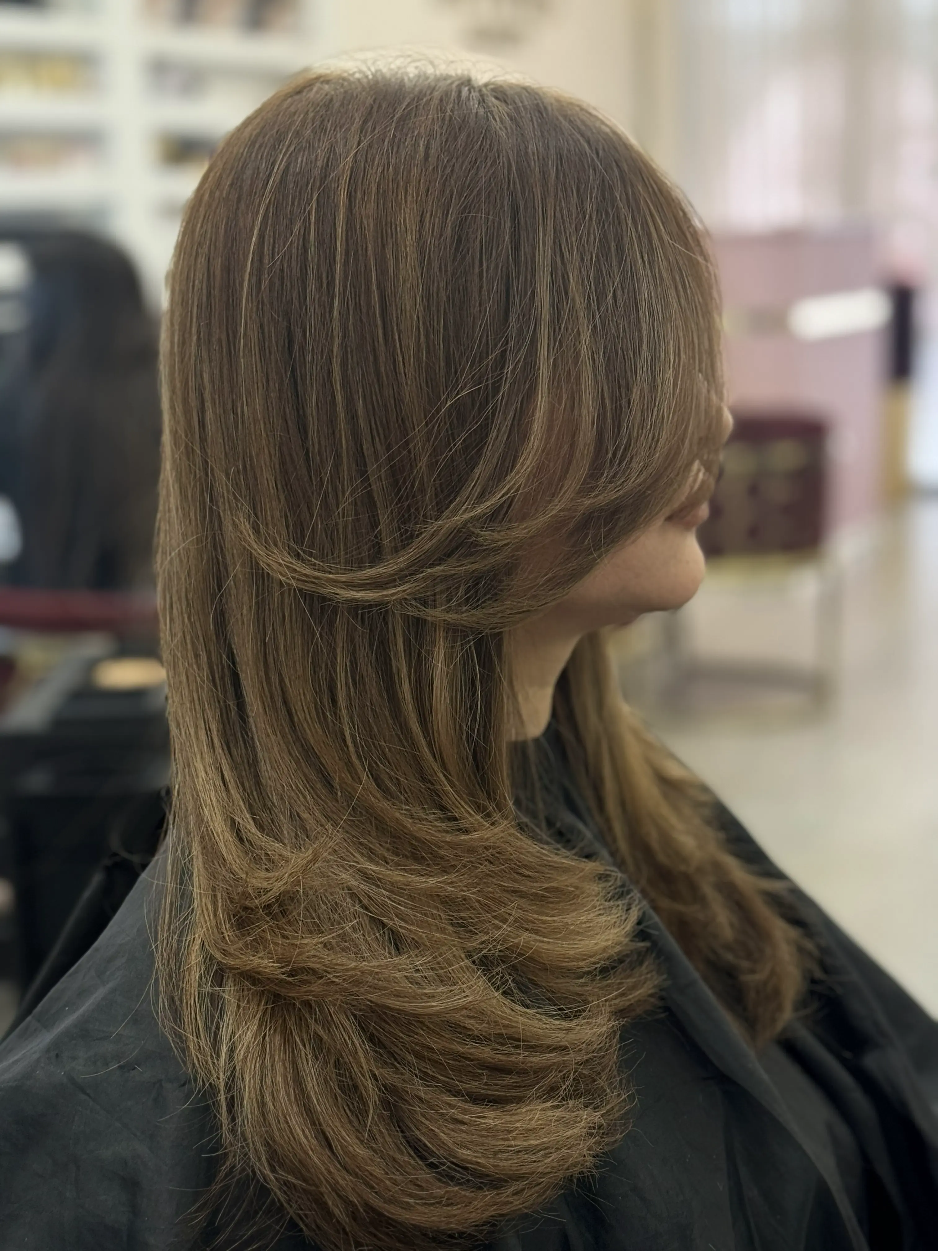 Hair styling result at Divine Beauty Salon