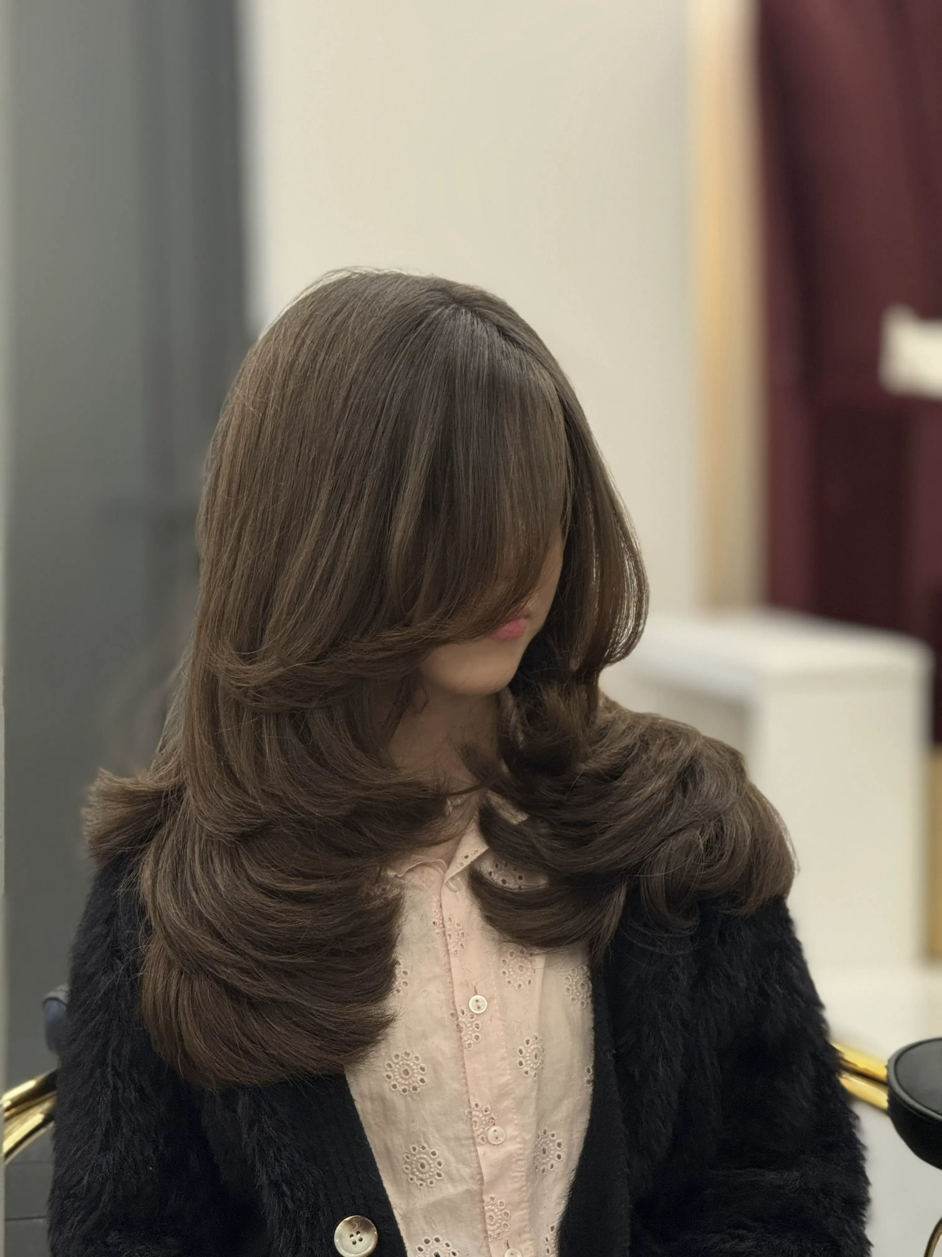 Hair styling result at Divine Beauty Salon